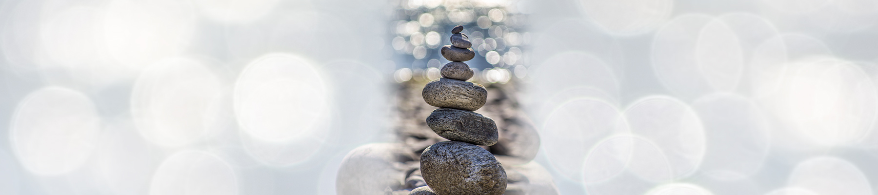 JT_systemischeaufstellungen_Header_1800x400 Steine aufeinander